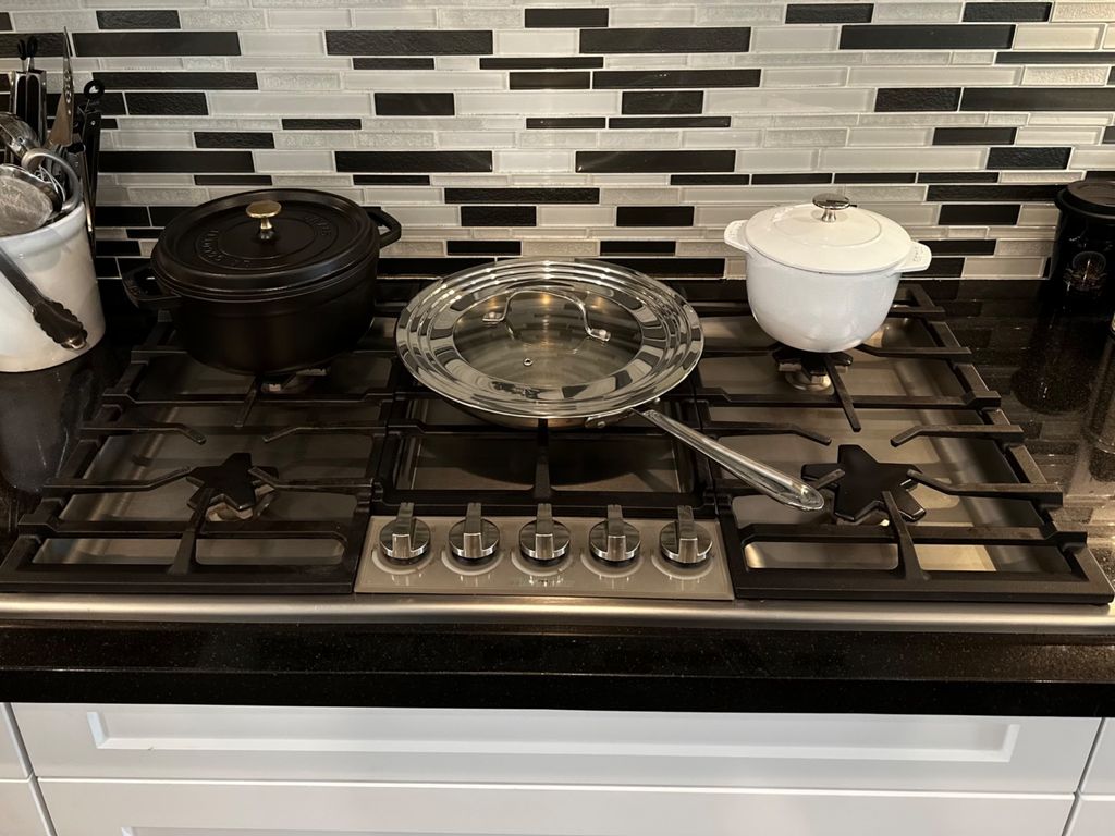 Installed gas range stovetop fitted cleanly into a kitchen counter